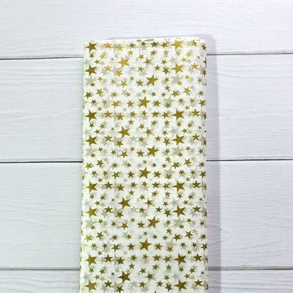 Bibuła dekoracyjna 50×65 cm (10 arkuszy) – biała w złote gwiazdki