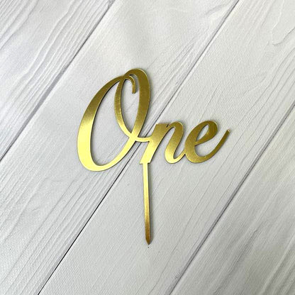 Topper na tort „One” na patyczku, złoty (Dekor 14)